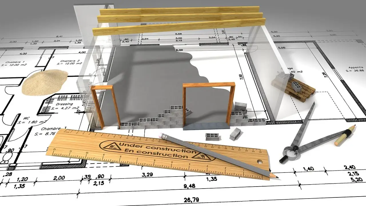 Plano de una casa en tres dimensiones acompañado de una regla y un lápiz